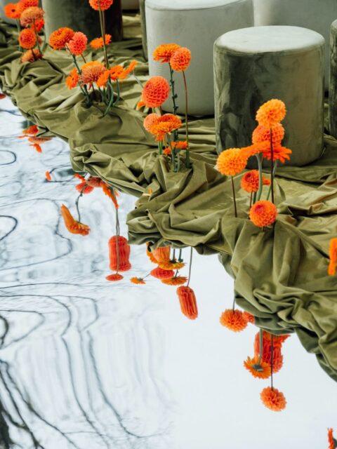 Burnt orange dahlias meet muted olive draping, creating a tablescape that feels both organic and undeniably editorial. From the sculptural floral placement to the mirrored reflection, every detail was intentionally designed to create movement, dimension, and a moment worth remembering.

Design is in the details.✨

#CaboBride #CaboBrideMagazine #WeddingDesign #WeddingEditorial #LuxuryWedding